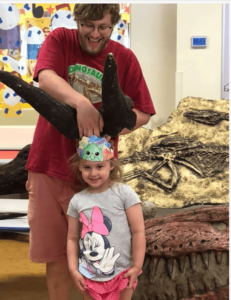 Kids digging for fossils and minerals to keep at a Dinosaurs Rock Birthday Party